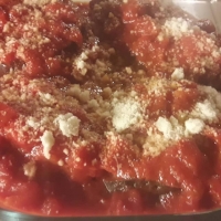 Medaglioni di melanzane ripiene al forno